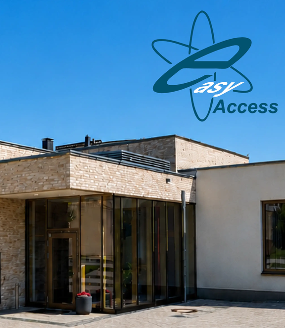 WILKA Referenzprojekt Haus Marien: modernes Kirchen- und Gemeindezentrum mit großzügiger Glasfassade, heller Natursteinarchitektur und barrierefreiem Eingangsbereich.